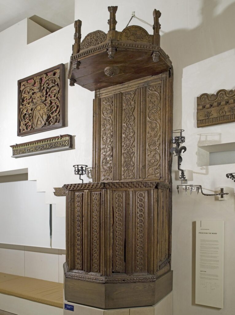 the Parton pulpit on display in the NMS, fixed to a wall